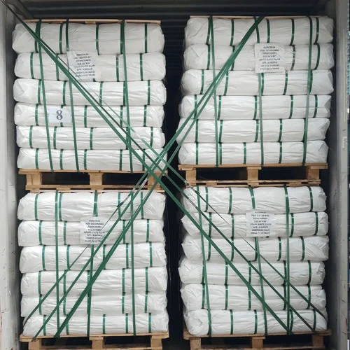 Woven bags loaded into shipping container for export